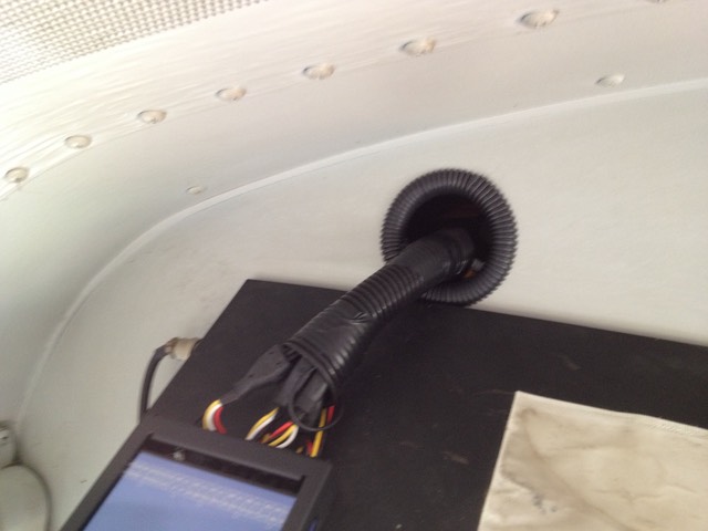 vehicle video event recorder harness and bulkhead access hole
